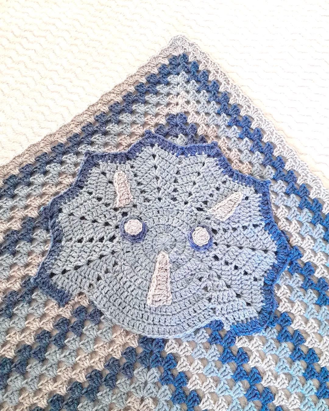 30 Dinosaur Blanket Crochet Patterns to Stitch for Kids, Nurseries, and Dino Fans 3 Huntley’s Dinosaur Blanket Crochet Pattern