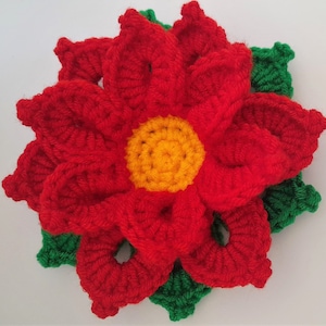 Termes britanniques du modèle de poinsettia au crochet