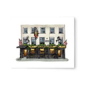 May include: A watercolour illustration of a pub called "The Kings Arms" with a Union Jack flag hanging outside. The pub has a black door and windows with green plants growing around them.