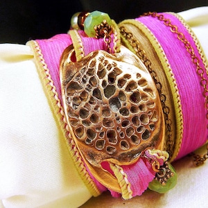 Copper bracelet with fuchsia silk ribbon