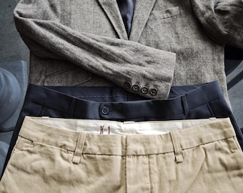 Un guardaroba capsule vintage maschile accuratamente selezionato, risalente agli anni '90.