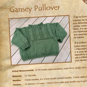 May include: A green knitted baby sweater with a cable stitch pattern. The sweater is 12-18 months (approximately), chest 25 inches, length 13 inches. The pattern includes 3 balls of yarn, 3.5 mm needles, and 4 x 3.5 mm double pointed needles.