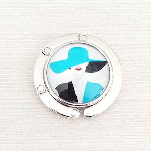 Glamour Geldbörse Haken, Stilvolle Elegante Lady Handtasche Kleiderbügel in Schwarz, Aqua und Weiß, Runde Faltbare Tragetasche Halter, Kompakte Tisch Accessoires