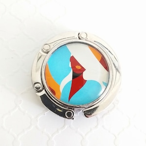 Sommer-Glamour-Geldbeutel-Haken, stilvolle Strand-Dame-Handtaschen-Aufhänger, eleganter runder faltbarer Tisch-Einkaufstaschenhalter, faltbarer kompakter Magnetverschluss