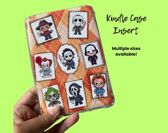 May include: Kindle case insert featuring cartoon horror characters on an orange and white argyle pattern. The case has a clear protective cover. Text on the image reads "Kindle Case Insert" and "Multiple sizes available!"