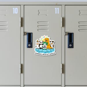 May include: A sticker featuring a group of cartoon characters, including a unicorn, panda, frog, dinosaur, and cow, standing on ice. The text "ICE MELTS" and "UNDER RESISTANCE" are also included.