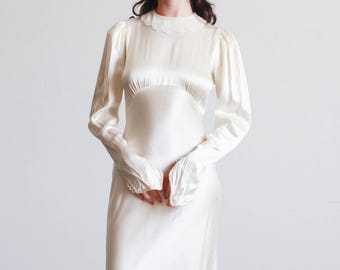 Vestido de festa em cetim líquido marfim da década de 1930