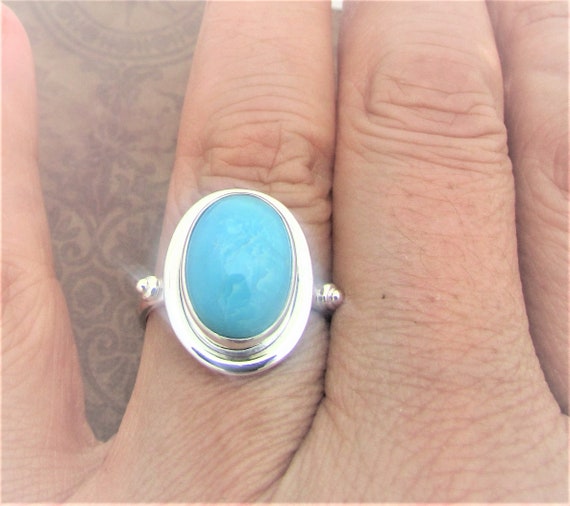 Sterling Silver Reconstituted Turquoise Ring with Rope Design Frame Sterling Silver Reconstituted Turquoise Ring with Rope Design Frame