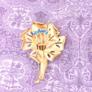 Vintage Gold Tone Lily Brooch: Solid Brass Flower with Blue Gems