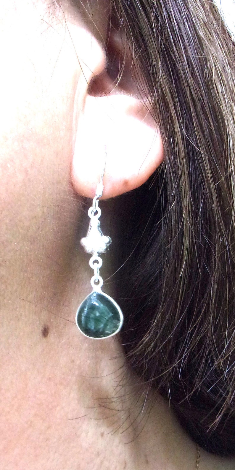Exquisite handcrafted Seraphinite and sterling silver drops. Beautiful artist design, 1.95in Long. The Gem is approx. .50in diameter.
