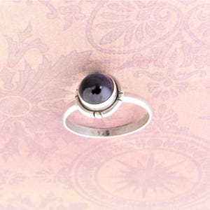 Small everyday rings, Made of 925 sterling silver and genuine gems. Each gem is approx. 1/4"
Round Amethyst is size 9
Rectangular Amethyst is size 8
Lavender oval shape size 9 gorgeous gemstone.
