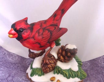 Porcelain red cardinal on snowy pine tree, Vintage Figurine 5.55" Tall- Like new.