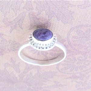 Small everyday rings, Made of 925 sterling silver and genuine gems. Each gem is approx. 1/4"
Round Amethyst is size 9
Rectangular Amethyst is size 8
Lavender oval shape size 9 gorgeous gemstone.