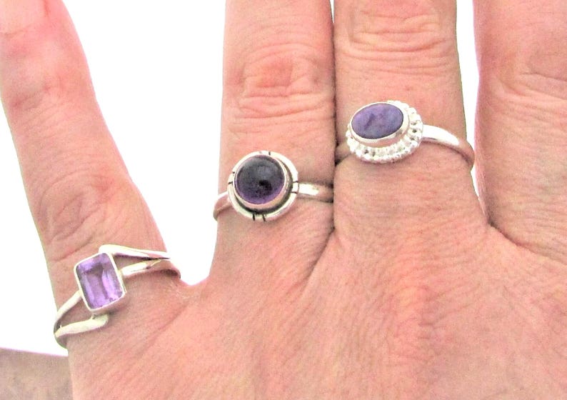 Small everyday rings, Made of 925 sterling silver and genuine gems. Each gem is approx. 1/4"
Round Amethyst is size 9
Rectangular Amethyst is size 8
Lavender oval shape size 9 gorgeous gemstone.