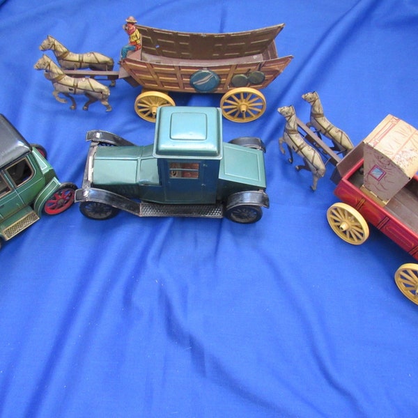 Tin Toys Horse Driven Wagons, 2 cars. Tin Toys