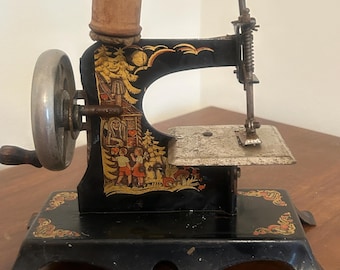 Casig Hansel and Gretal Child’s Toy Sewing Machine