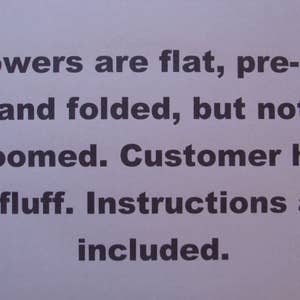 May include: A note with instructions for assembling flowers. The note reads: "Flowers are flat, pre-cut and folded, but not bloomed. Customer has to fluff. Instructions are included."