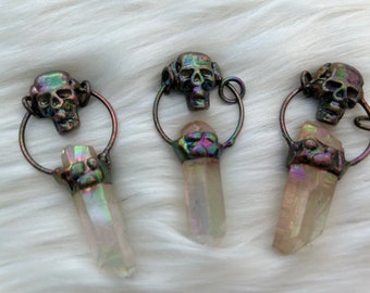 Aura Clear Quarts Skull Pendent