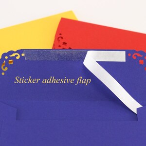 May include: Three envelopes in yellow, red and blue with decorative edges. The blue envelope has a white sticker adhesive flap labelled "Sticker adhesive flap".