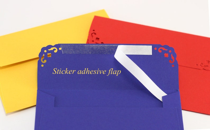 May include: Three envelopes in yellow, red and blue with decorative edges. The blue envelope has a white sticker adhesive flap labelled "Sticker adhesive flap".