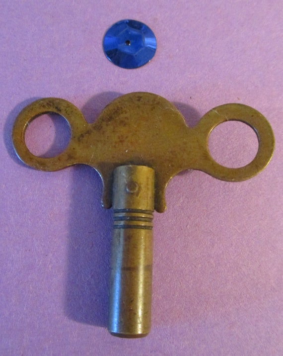 Antique Brass Clock Key Size 6 / 3.75 Swiss / 3.6 American Stk# K26