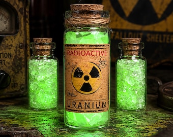 Vidrio marino de uranio en vial de 2", etiquetas radiactivas de estilo vintage, curiosidades/rarezas reactivas a los rayos UV.