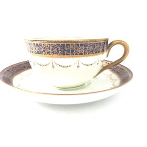 Adderley 1920&#39;s dark blue and gold bone china teacup and Saucer