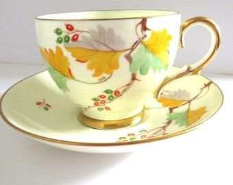 Art Deco Paragon hand painted golden yellow bone china teacup and saucer