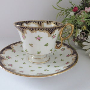 Antique Crown Staffordshire 1907 dark blue and pink floral Bone China Cup and Saucer