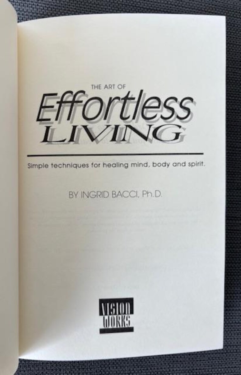 May include: A white ceramic mug with a black handle and the text "But First, Coffee" in a black, bold font. The mug is sitting on a wooden surface. The mug is approximately 4 inches tall.