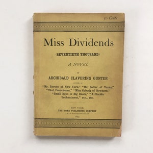 Miss Dividends: A Novel by Archibald Clavering Gunter. Vintage Paperback Novel. Fiction. Antique Fiction. 1800s Novel.