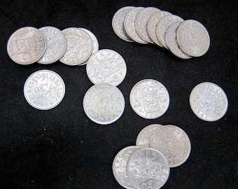 Ten (10) silver coins. Dutch East Indies, 1/10 G. Uncirculated. Circa 1940's