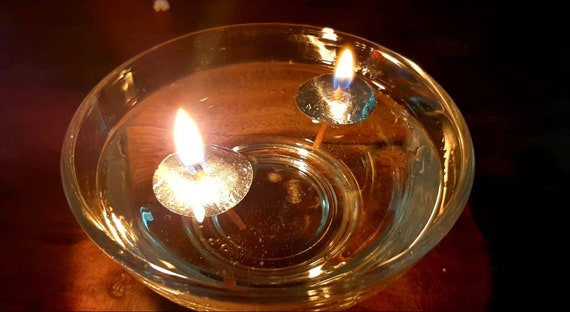 Here's a really quick and simple way to make a floating-wick oil