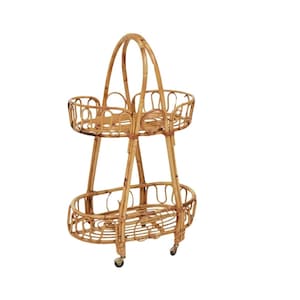 May include: A two-tiered rolling cart made of natural woven rattan with an oval shape. The cart has a handle on the top and wheels on the bottom.