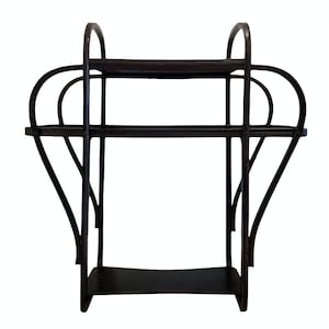 May include: Black metal shelf unit with three shelves. The shelves are curved and have a heart shape. The unit is freestanding and has a modern design.