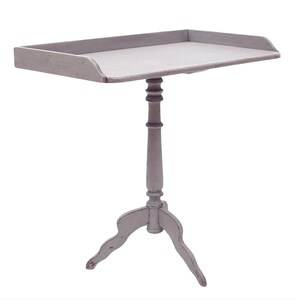 May include: A white painted wooden table with a single pedestal base and three legs. The table top is rectangular and has a slightly rounded edge.
