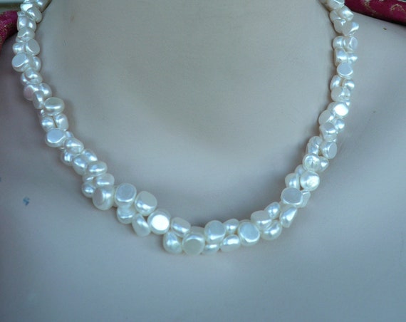 A striking vintage beaded 2 stranded faux pearl necklace