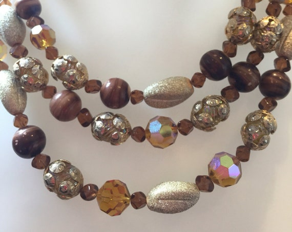 beautiful three stranded vintage Amber and gold glass beaded necklace signed by Vendome
