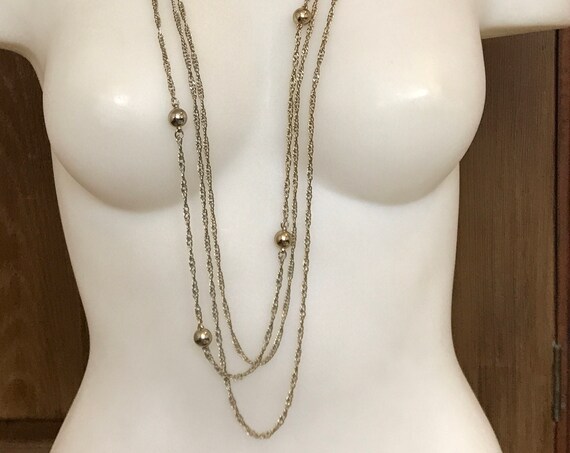 long 30 inch three stranded gold toned layered chain necklace set with gold ball beads