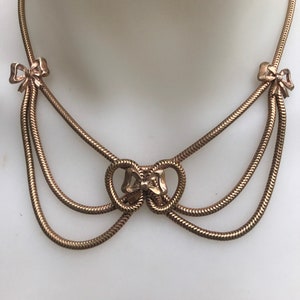 Authentic vintage Retro 1940s unusual Gold plated draped snake chain bow necklace