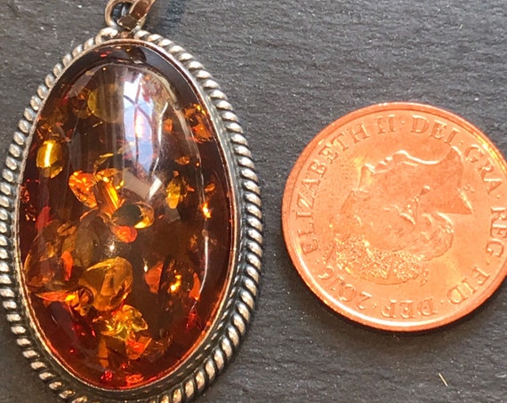 Vintage silver and Baltic Amber oval pendant