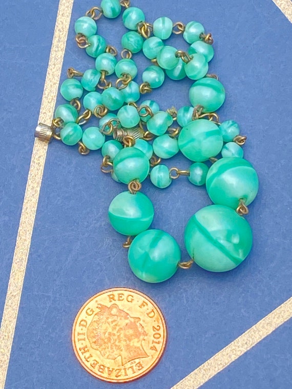 A striking Art Deco 1930s hand made glass  beaded on  wire necklace fantastic mint green colour