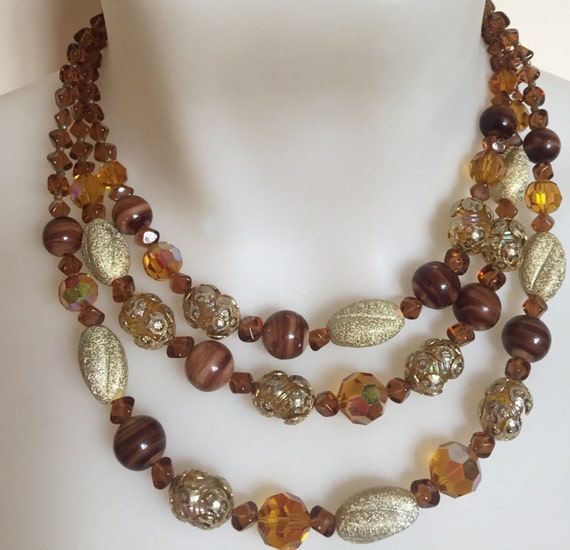 beautiful three stranded vintage amber snd gold glass beaded necklace by Vendome