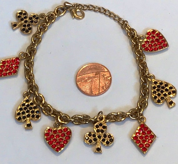 Beautiful vintage gold plated heavy charm bracelet with red and black crystal playing card charms Hearts,Clubs,Spades and diamonds