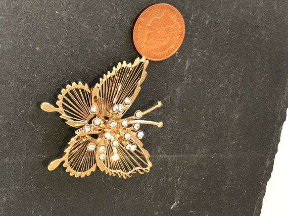 Beautiful vintage gold toned diamanté signed MONET butterfly brooch