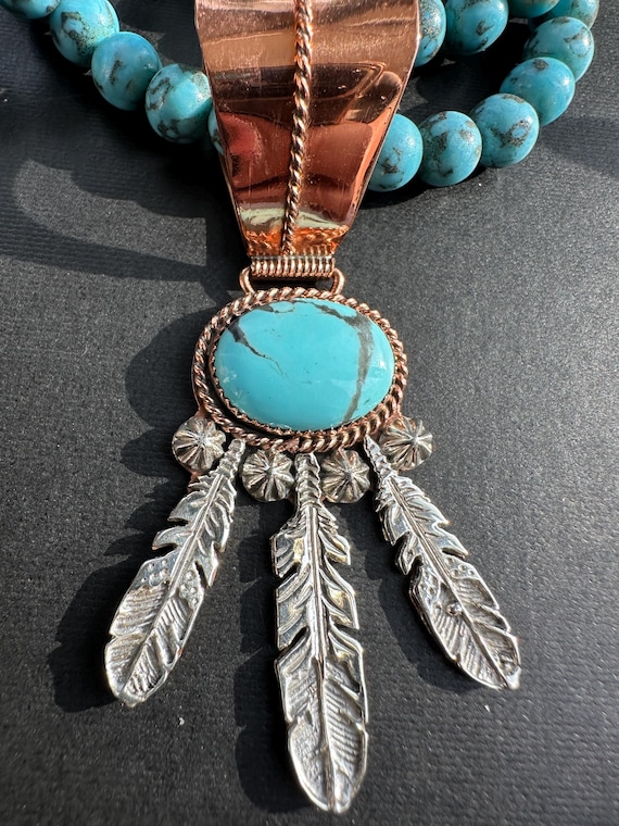 vintage signed Running Bear copper and silver Navajo feather pendant statement piece