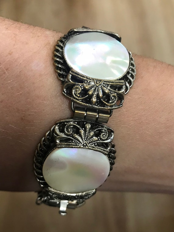 large statement piece Art Deco era mother of pearl and ornate filigree bracelet