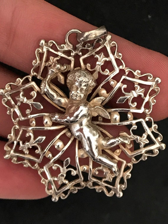 Unusual French vintage silver plated cherub putti Angel pendant eight pointed star Fleur de lys