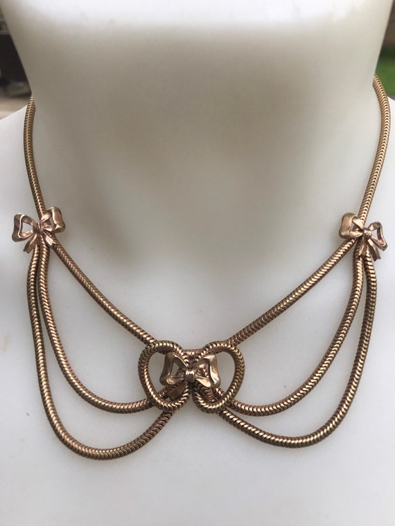 Authentic vintage Retro 1940s unusual Gold plated draped snake chain bow necklace