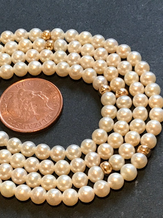 26inch pearl necklace with 14k yellow gold clasp and balls